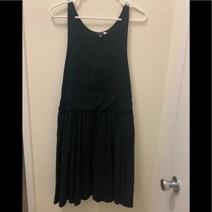 Simple knit little black dress with textured skirt